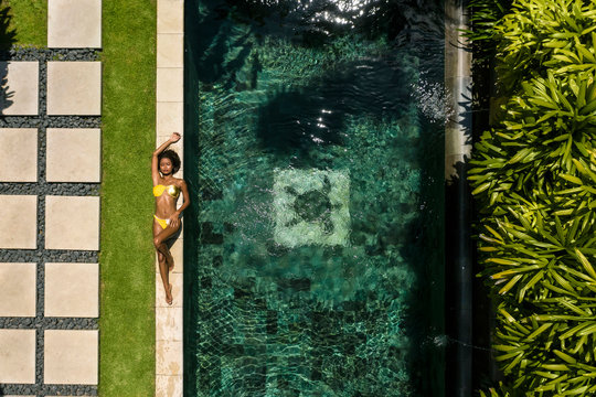 Balinese Woman in her Pool