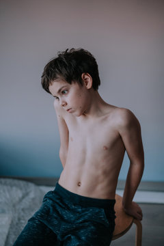 Portrait of a young boy at home