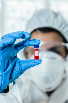 Biologist working with blood samples in the lab