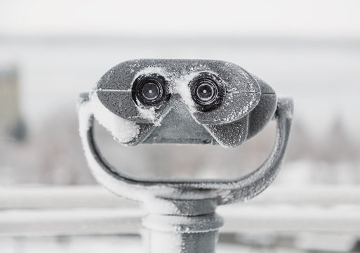 frozen metal binoculars