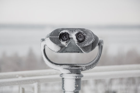 frozen metal binoculars