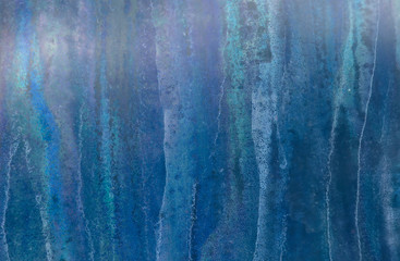 A virtual abstract 'forest' of iridescent tree trunks, actually dripping bacteria patterns between the panes of an exterior commercial glass door.
