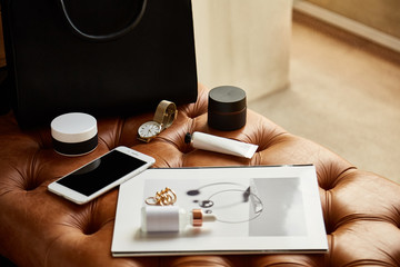 Woman items laying over leather couch
