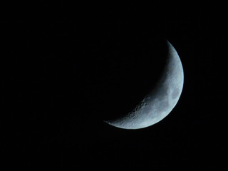 Naklejka premium crescent moon in the night sky