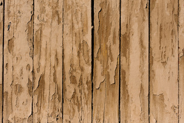 Beige brown Board background with cracked paint
