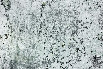 Texture of a concrete wall with cracks and scratches which can be used as a background