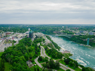 The aerial view of Niagara River and rainbow bridge