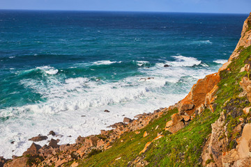 Cabo da Roca, Portugal. Lighthouse and cliffs over Atlantic Ocean, the most westerly point of the European mainland.