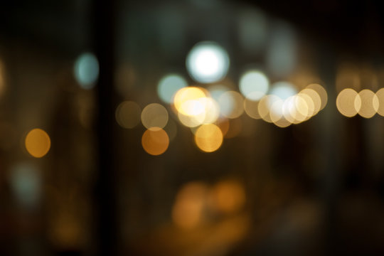 Defocus, out of focus traffic bokeh. Stock images of night traffic blurry in downtown city with a lots of motorcycles, motorbike, bus, car transport on the road. Defocused city in traffic in night