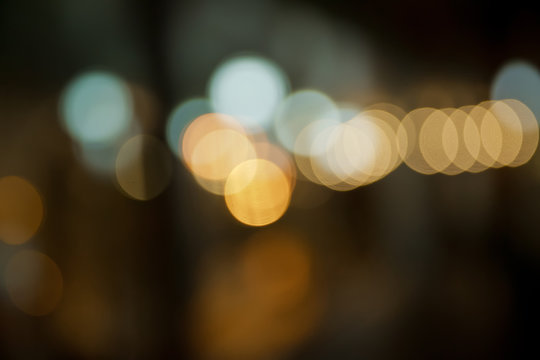 multi color bokeh light background . Bokeh light in the night road .colorful bokeh of city light at night, landscape background . Blur view of city traffic . black blure background