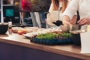 The chef of the Swedish company prepares food