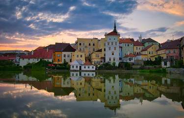 Fototapeta na wymiar J. Hradec city at sunset view across pond