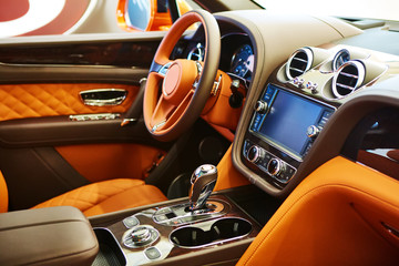 Brown leather interior of a luxury car