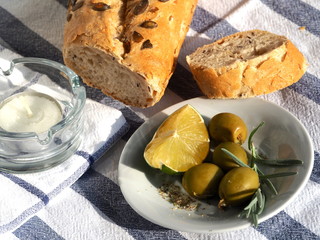 italian food with olives and lemon