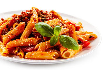 Penne with meat, tomato sauce and vegetables