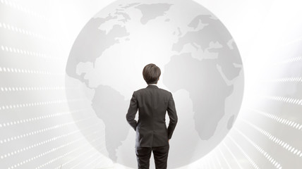 Business man looking for global earth, opportunity concept, Business man standing in front of white light color world map in future technology light background