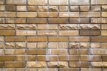 Wall background of rectangular ceramic tiles beige color, texture backgrounds for graphic design. Wallpaper abstract illustrations made of natural stone.