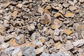 Stone granite Quarry. Rock texture background. Stone on the mountain nature background.