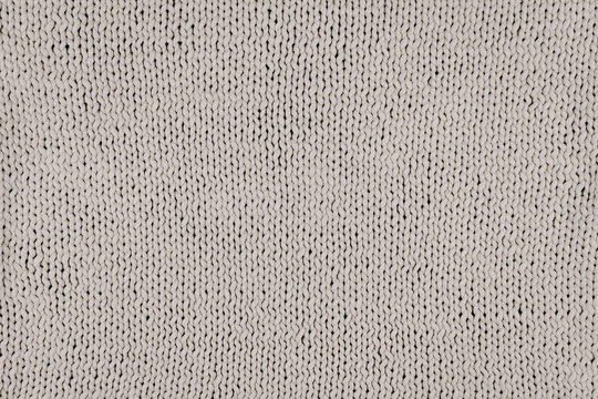 Knitted T shirt yarn knit background. Grey Knitted Fabric Texture. Knitwear needlework hobby background