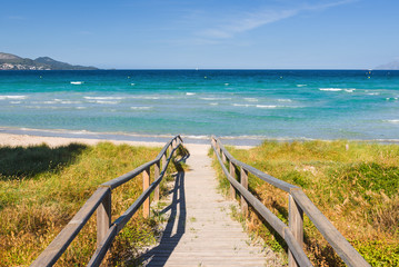 Scenic stairway leading down to the beautiful Muro beach (Playa de Muro) in Mallorca. Spain