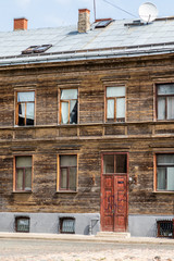 Facade of an old wooden house in the old center of Riga, Latvia, Europe