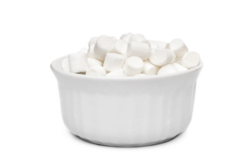 Full bowl of small white marshmallow on white background.