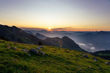 Sunrise over the tyrol alm high over the mountains scenery