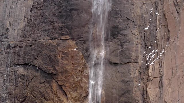 Close-up drone flight to Yosemite Waterfall, USA, 4K