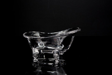 Glazed bathtub  on black background