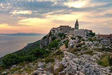 The famous Lubenice village at sunset over the sea in Cres island Croatia