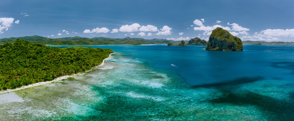 Panoramic aerial view of Bacuit archipelago. Pinagbuyutan island and El Nido mainland. Palawan,...