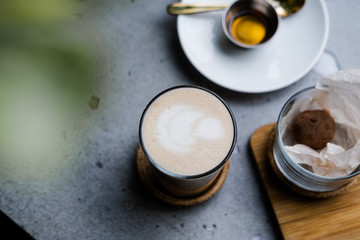 Obraz na płótnie Canvas Masala chai latte on gray concrete table