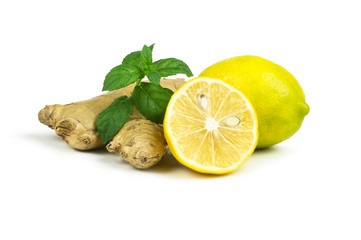 Group of ripe fresh lemons with mint leaves and ginger root isolated on white background. Citrus fruit, lime