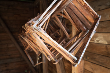 Wooden honeycomb frames hanging from the ceiling of an old log cabin in the Salzkammergut region, OÖ, Austria