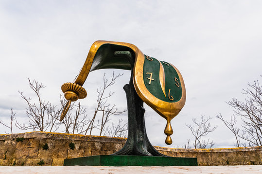 Matera, Italy - March 12, 2019: Sculpture Dal&iacute;'s melted clock displayed on the street on the occasion of the cultural capital of the city.