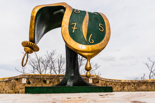 Matera, Italy - March 12, 2019: Sculpture Dal&iacute;'s melted clock displayed on the street on the occasion of the cultural capital of the city.