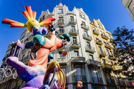 Valencia, Spain - March 16, 2019: Fallas stone cartons of a Falla profusely painted with striking colors, during the Valencian fiestas exposed in the streets before being burned.
