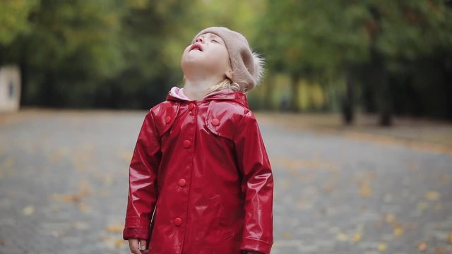 Sobbing pretty little girl wipes snot and tears, bad mood, tantrum, child integrity