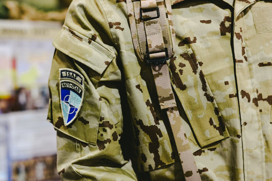 Valencia, Spain - January 4, 2019: Soldier costume with detail of the NATO ISAF badge during a military show.