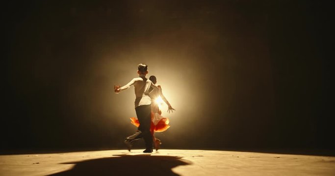 Talented asian kids showing ballroom dance on stage, on smoked black background - childhood dream, childhood memories concept 4k footage