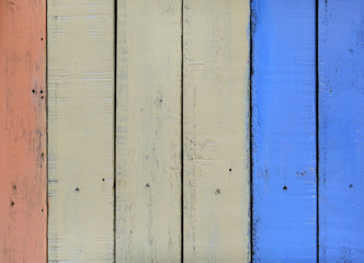 Old pastel painted wood wall texture background.