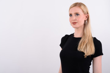 Obraz premium Young beautiful British woman with blond hair against white background