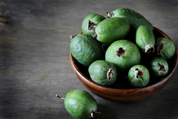 feijoa. berries of the guava family. grows in the tropics and subtropics. copy space