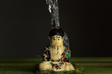 figurine cover by water
