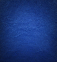 Fototapeta premium Blue background paper with ripped distressed old grunge texture in elegant vintage design