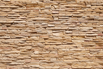 texture of rectangular decorative stone horizontal lines and oblong stones of orange