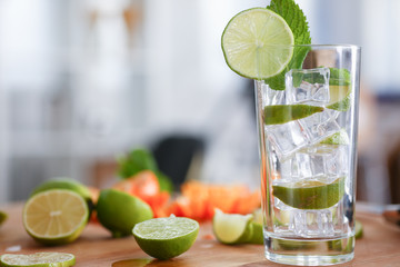 Mojito cocktail with vodka leaf mint and lime pint printing for skinned kitchen background interior bar products home furnishings trendy design black gray gradient sliced fruits and ice.