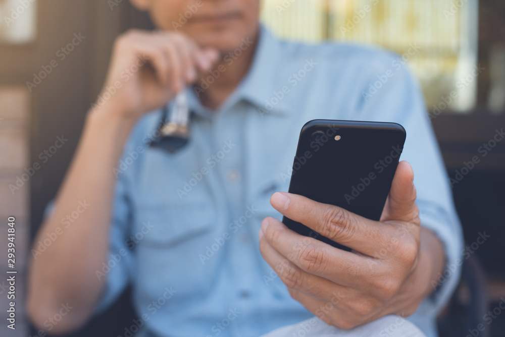 Poster man using smartphone