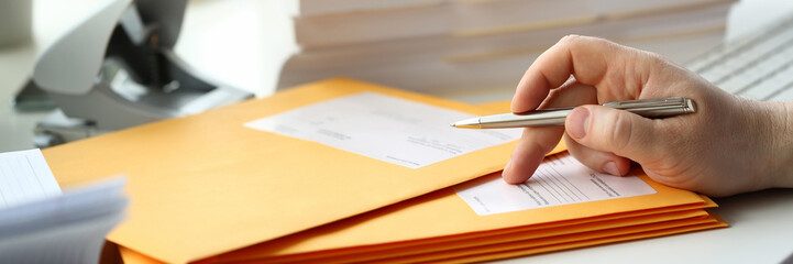 Businessman hold hand silver pen. Write envelope adress inbox post concept background