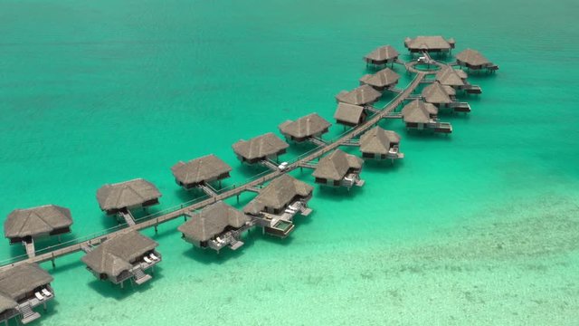 Aerial view of overwater huts in Bora Bora, French Polynesia.